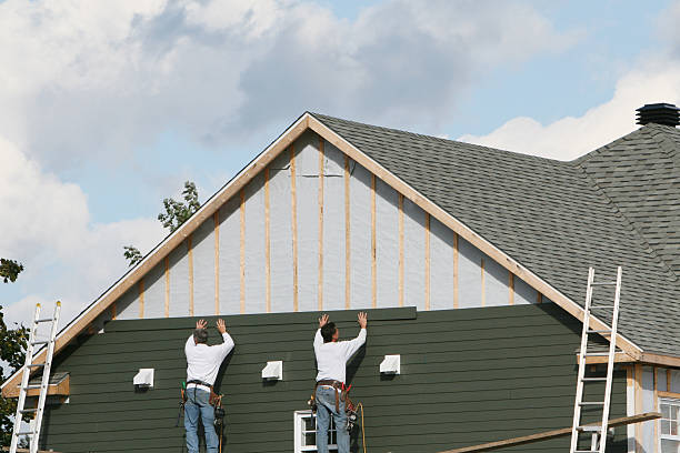 Professional Siding Installation technician working in White, PA